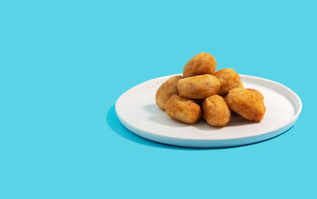 Tapas croquettes, traditional Spanish or French snack usually prepared with mashed potatoes, meat or vegetables. Photo with copy spaceの写真素材