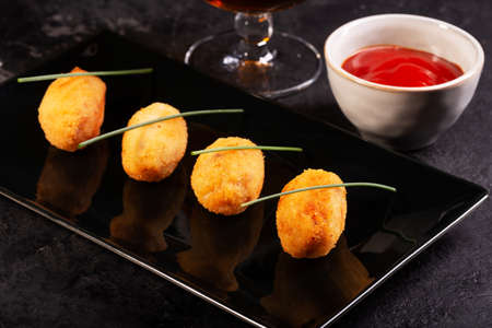 Tapas croquettes, traditional Spanish or French snack usually prepared with mashed potatoes, meat or vegetablesの写真素材