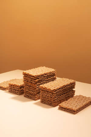Crispbread on a beige surface, modern isometric creative minimalism conceptの写真素材