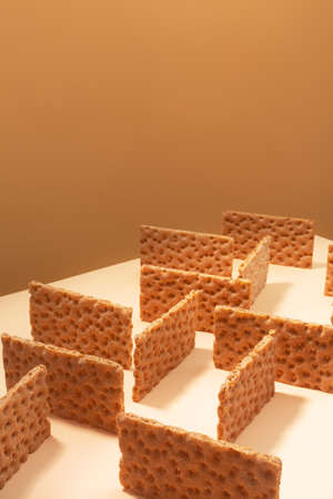 Crispbread on a beige surface, modern isometric creative minimalism conceptの写真素材