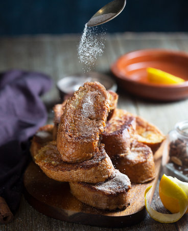 Traditional Spanish torrijas or French toast. Dessert for Christmas time or Pascuaの写真素材
