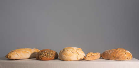 Bread on a table covered with a tablecloth