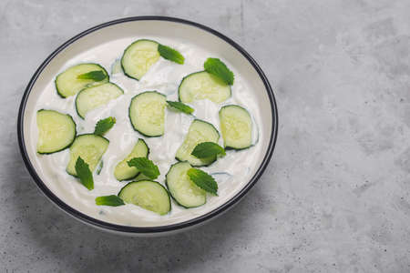 Traditional Indian Raita with cucumber, greek yoghurt and corianderの写真素材