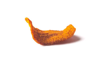Dried organic carrot chip isolated with shadow. Veggie snack