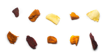 Deconstructed vegetable organic potato, carrot and beetroot chips isolatedの写真素材