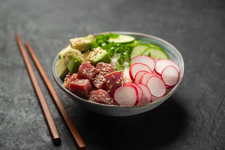 Traditional Hawaiian Poke Bowl prepared with Tuna Fish, rice and vegetablesの写真素材