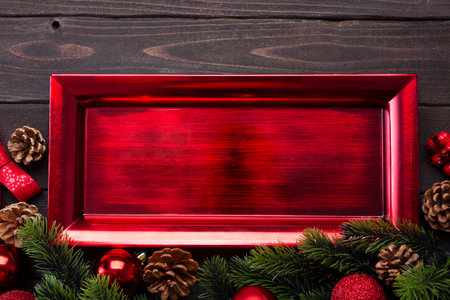 Christmas table setting consisting of a red white plate. Top view with copy spaceの写真素材