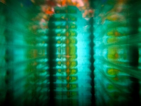 blured green colored mosaic decorative ornament. Matrix theme.の写真素材