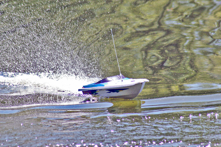 Boat model in motion on the water. Outdoorの写真素材