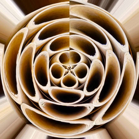 transformation of spherical panorama 360 degrees. Spherical abstract top of view on cardboard sleeves in a box. Lattice of round curly objects.の写真素材