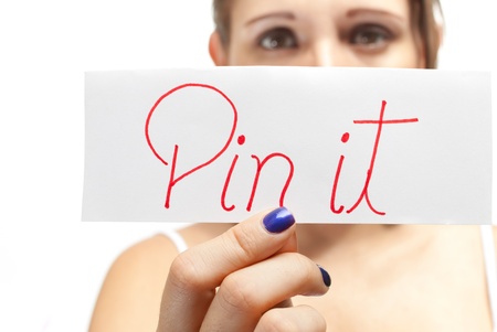 woman holding a message pin itの写真素材