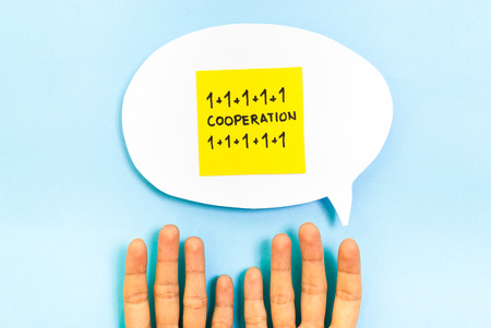 Speech bubble Cooperation concept on blue backgroundの写真素材