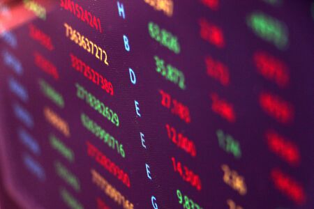 colorful data numbers on screen depicting the economy market