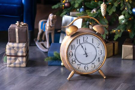 New Year 2020. Christmas beautiful bokeh lights on Golden warm background. Christmas toy. Golden abstract, blinking, blurred, soft focus, out of focus, blur.の写真素材