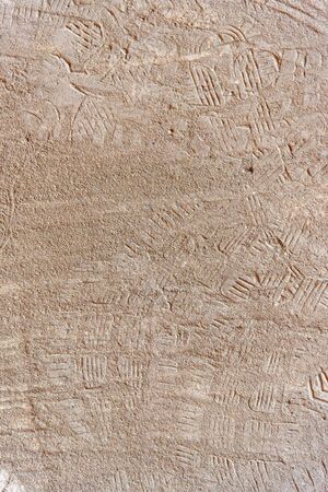 brown sand or concrete with sole prints, texture or background for designの写真素材
