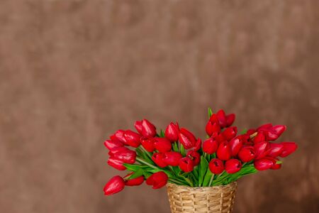 Bouquet of red tulips for Valentine's day as a surprise or birthdayの写真素材