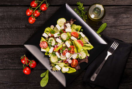 Raw barbun with lime and rosmary on black wooden plank. Top view.の写真素材