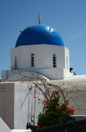 An orthodox church made in a typical greek style of the Santorini islandの写真素材
