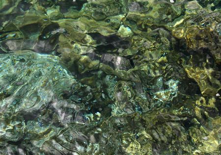 sea water mosaics made of underwater stonesの写真素材