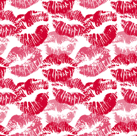 Seamless pattern with lipstick kisses. Lips imprints of red and pink shades isolated on a white background. Endless ornament your print, wrapping or romantic greeting card designのイラスト素材