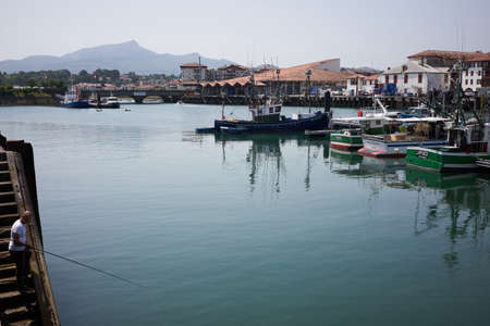 Saint Jean de Luz, France - July 22, 2019 - View of fishing boats in the harbor of Saint-Jean-de-Luz