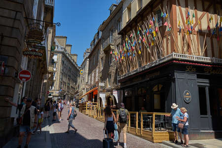 Saint-Malo, France - July 23, 2018 - walk through the streets of the old town of Saint-Malo around the crowded shops one summer afternoonのeditorial素材