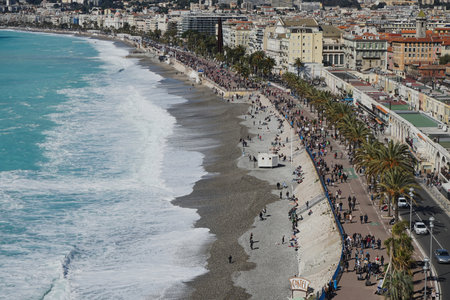 Nice, France - March 30, 2018 - view from above on the English Promenade. The Promenade des Anglais is a promenade along the Mediterranean at Niceのeditorial素材