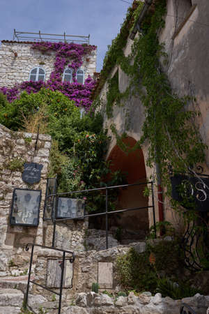 Eze, France - June 17, 2021 - a medieval town in the hills of the French Riviera in the sunny spring...