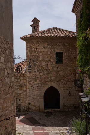 Eze, France - June 17, 2021 - a medieval town in the hills of the French Riviera in the sunny spring afternoon - walk through its labyrinth of streets and its ancient cornersのeditorial素材