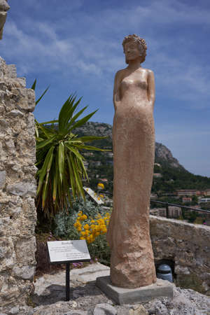 Eze, France - June 17, 2021 - the exotic garden of Eze  with statues of resplendent women