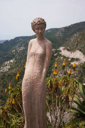 Eze, France - June 17, 2021 - the exotic garden of Eze  with statues of resplendent women