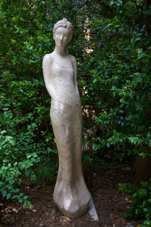 Eze, France - June 17, 2021 - the exotic garden of Eze  with statues of resplendent womenのeditorial素材
