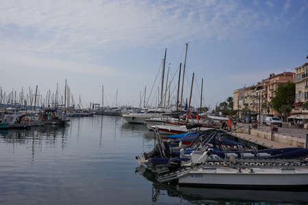 Cannes, France - June 16, 2021 - view of the Old Port - historical site with classic sailboat and modern yachts hosting celebritiesのeditorial素材