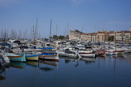 Cannes, France - June 16, 2021 - view of the Old Port - historical site with classic sailboat and modern yachts hosting celebritiesのeditorial素材