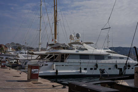 Cannes, France - June 16, 2021 - view of the Old Port - historical site with classic sailboat and modern yachts hosting celebritiesのeditorial素材