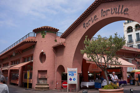 Cannes, France - June 16, 2021 - Forville Market is Cannes' favorite market and offers organic vegetables, local wine, fresh fish, and fresh flowers for the table.のeditorial素材