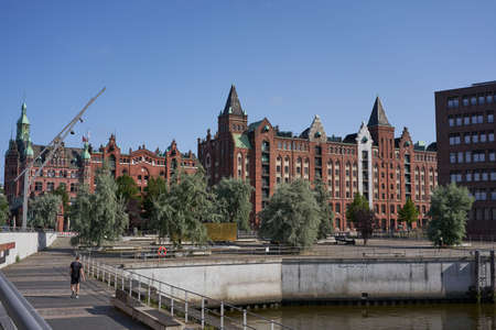Hamburg, Germany - July 18, 2021 - The Speicherstadt - City of Warehouses - is the largest warehouse district in the world where the buildings stand on timber-pile foundations, oak logsのeditorial素材