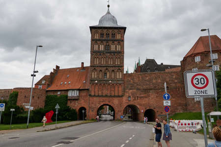 Luebeck, Germany - July 19, 2021 - The Burgtor is the northern city gate of Hanseatic LÃ¼beck. It is one of two towered gates remaining from the medieval fortifications.のeditorial素材