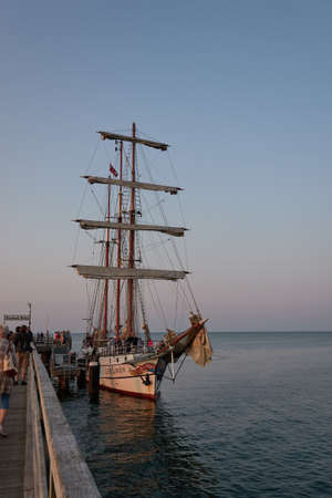 Binz, Germany - July 22, 2021 - The Loth LoriÃ«n is a three-masted barquentine flying the Dutch flag at duskのeditorial素材