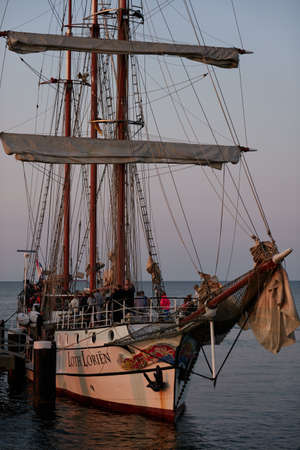 Binz, Germany - July 22, 2021 - The Loth LoriÃ«n is a three-masted barquentine flying the Dutch flag at duskのeditorial素材