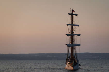 Binz, Germany - July 22, 2021 - The Loth LoriÃ«n is a three-masted barquentine flying the Dutch flag at duskのeditorial素材