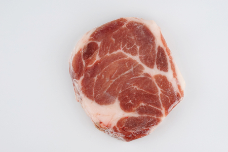 Raw meat, beef and pork steak on black backgroundの写真素材
