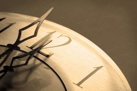 analog watch in midnight close-up sepia toned