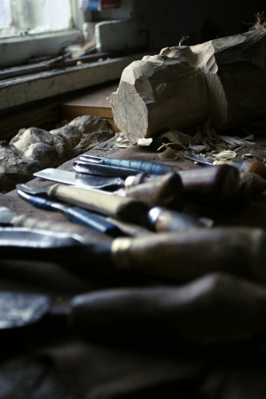 dirty workshop of woodcarver with instruments setの写真素材