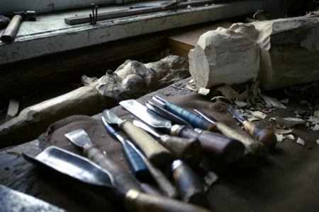 dirty workshop of woodcarver with instruments setの写真素材