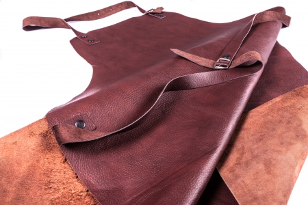 Brown leather apron protection for welder