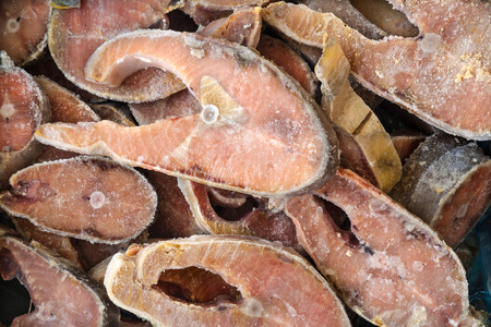 several slices of frozen fishの写真素材