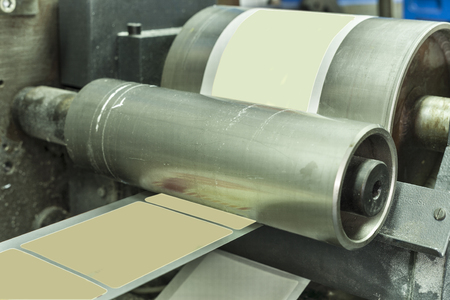 Printing at high speed on offset machine. Label, Rolled Up, Printing Out, Group of Objects, Merchandiseの写真素材
