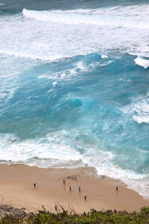 Surf fishermen below Albany Wind Farm in Western Australia.の写真素材