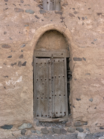The door of the old fort at Al Naslah, United Arab Emirates.の写真素材
